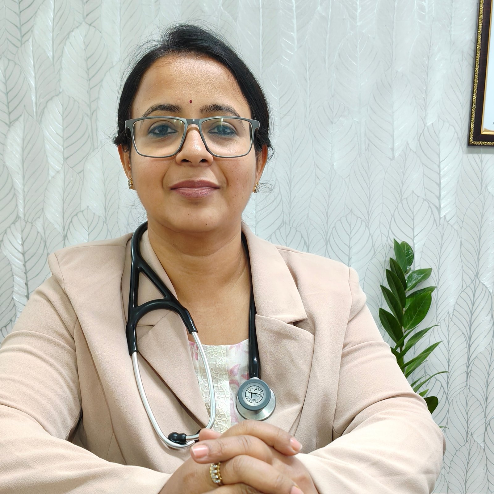 Dr. Anjali Verma, MD – General Medicine, sitting at B Healthy Clinic with a stethoscope, providing expert diabetes and general healthcare in Nipania, Indore.